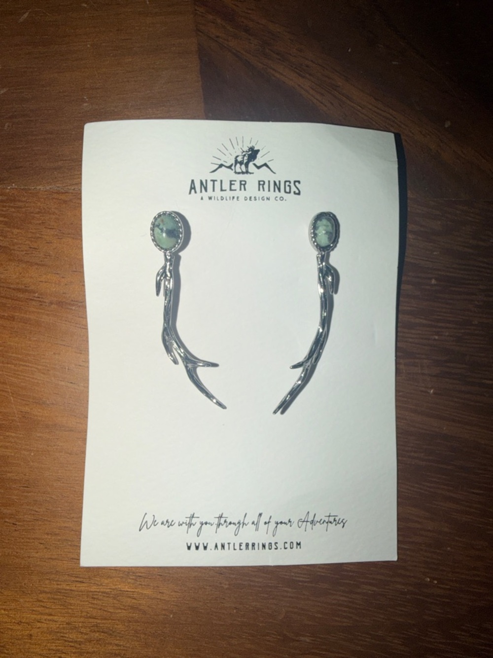 Silver Antler Drop Earrings with Green Stone